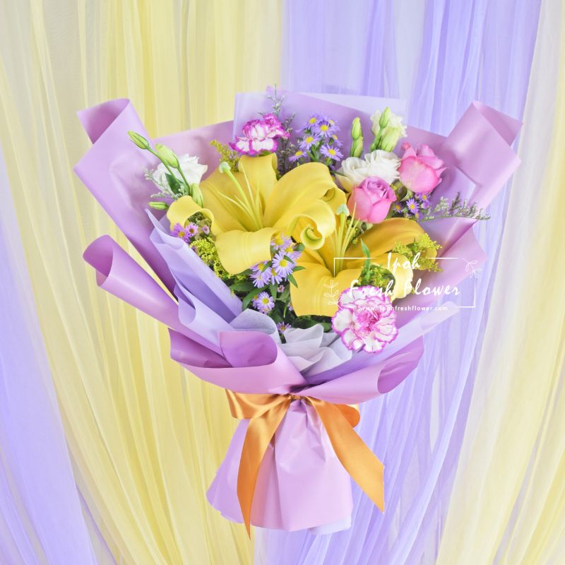 Ravanzel| Lilies,Roses & Carnation Fresh Flower Bouquet