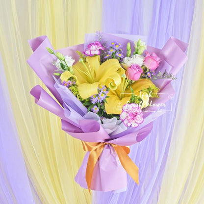 Ravanzel| Lilies,Roses & Carnation Fresh Flower Bouquet