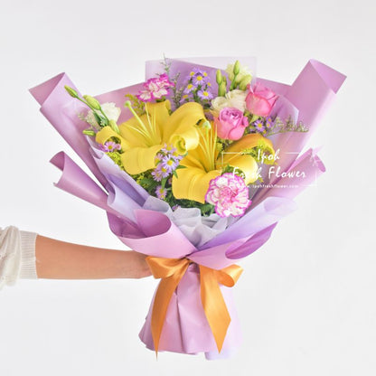 Ravanzel| Lilies,Roses & Carnation Fresh Flower Bouquet