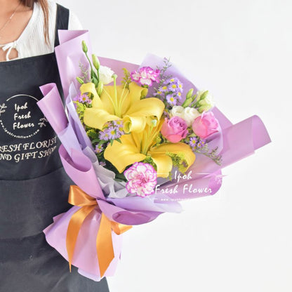 Ravanzel| Lilies,Roses & Carnation Fresh Flower Bouquet